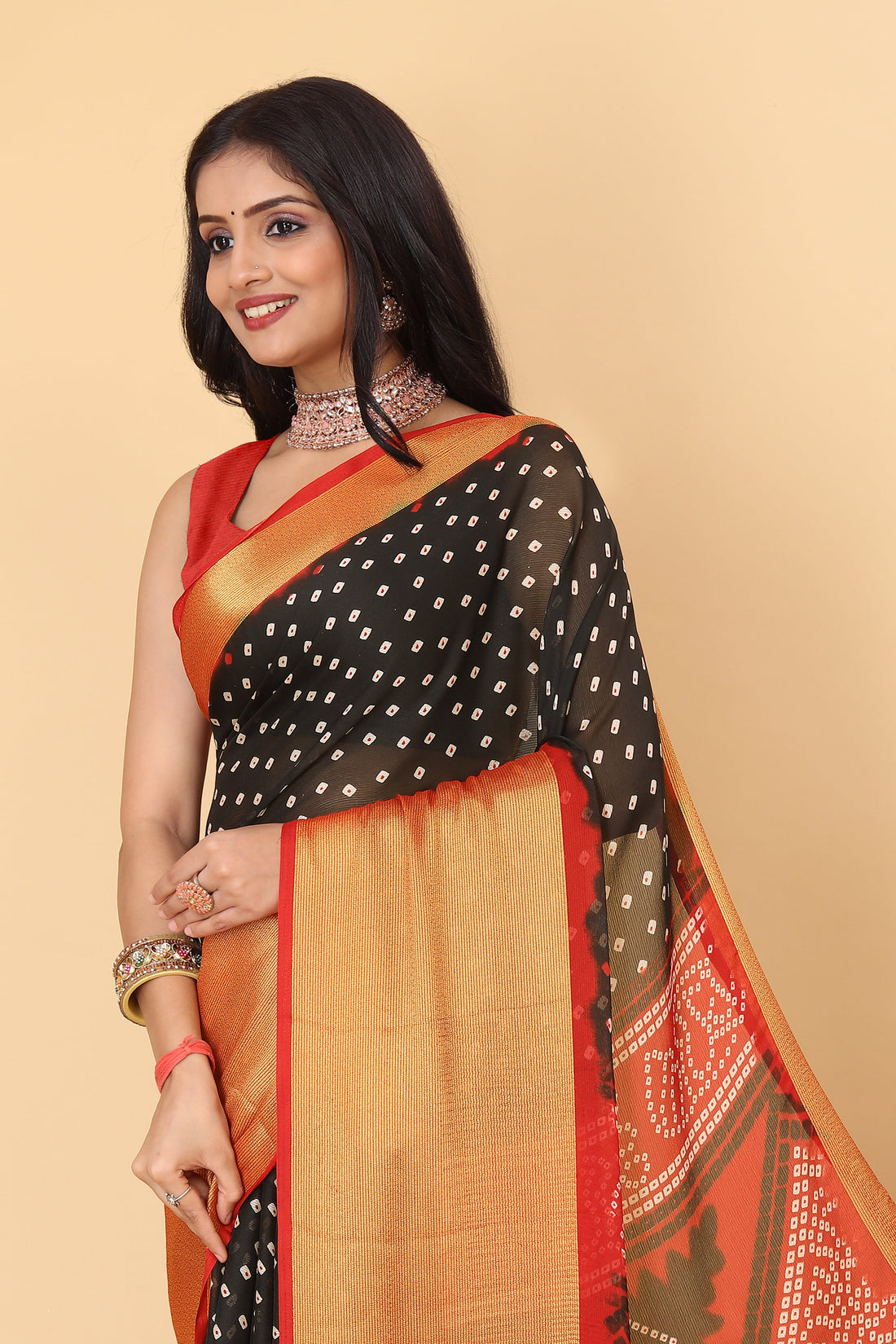 Bandhani Printed Moss Chiffon Black Saree with Gold Jari Border | Ivaara.