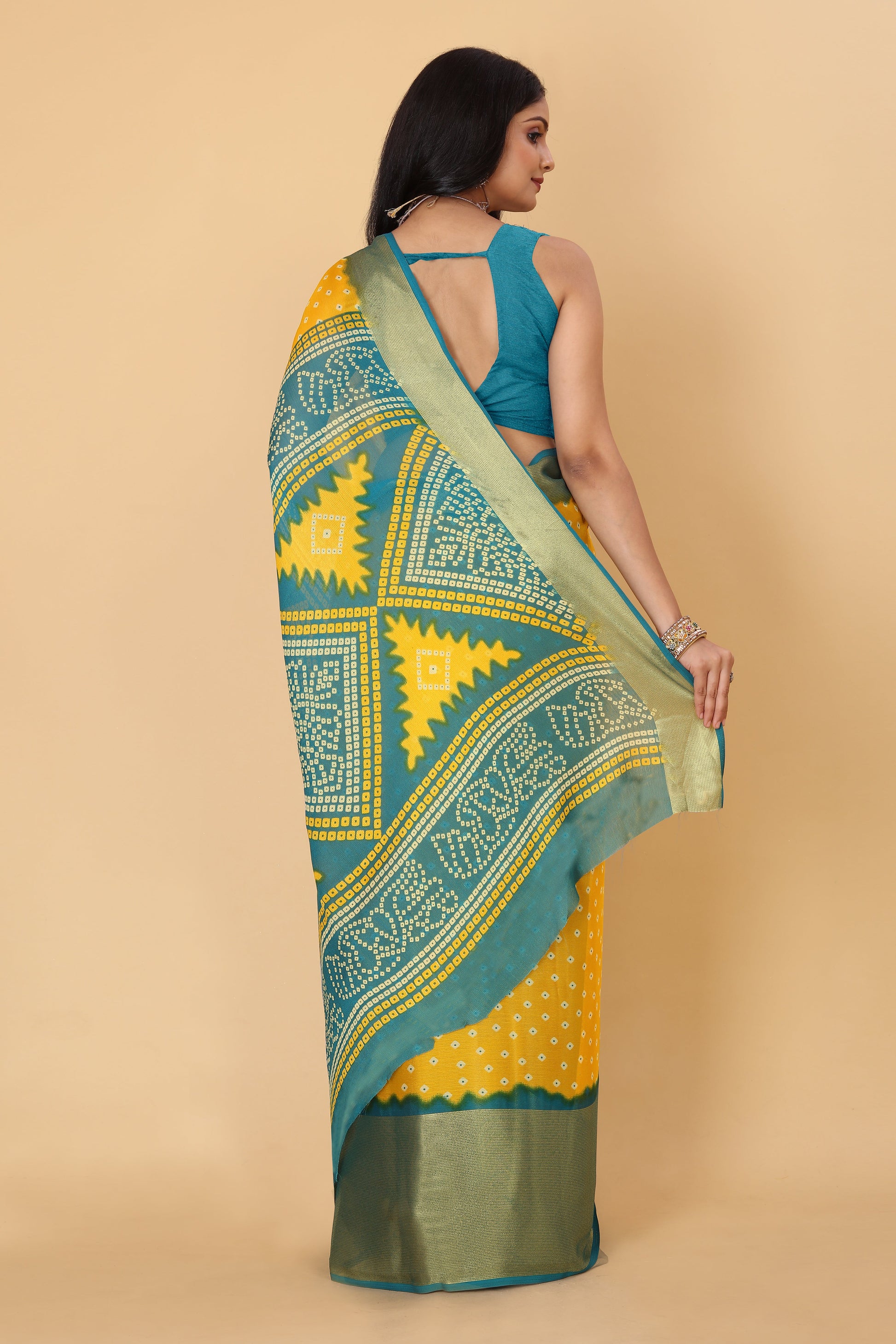Bandhani Printed Moss Chiffon Mustard Saree with Gold Jari Border | Ivaara.