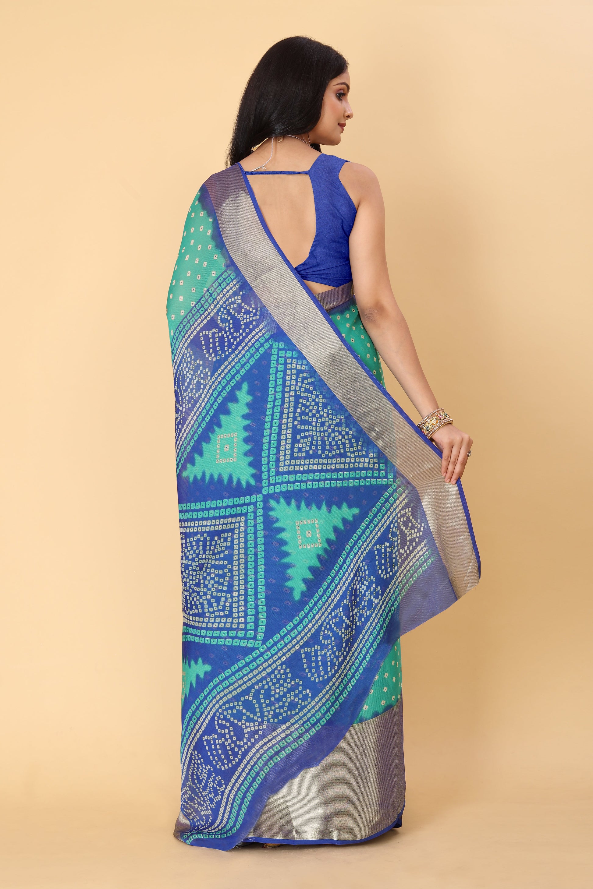 Bandhani Printed Moss Chiffon Sea Blue Saree with Gold Jari Border | Ivaara.