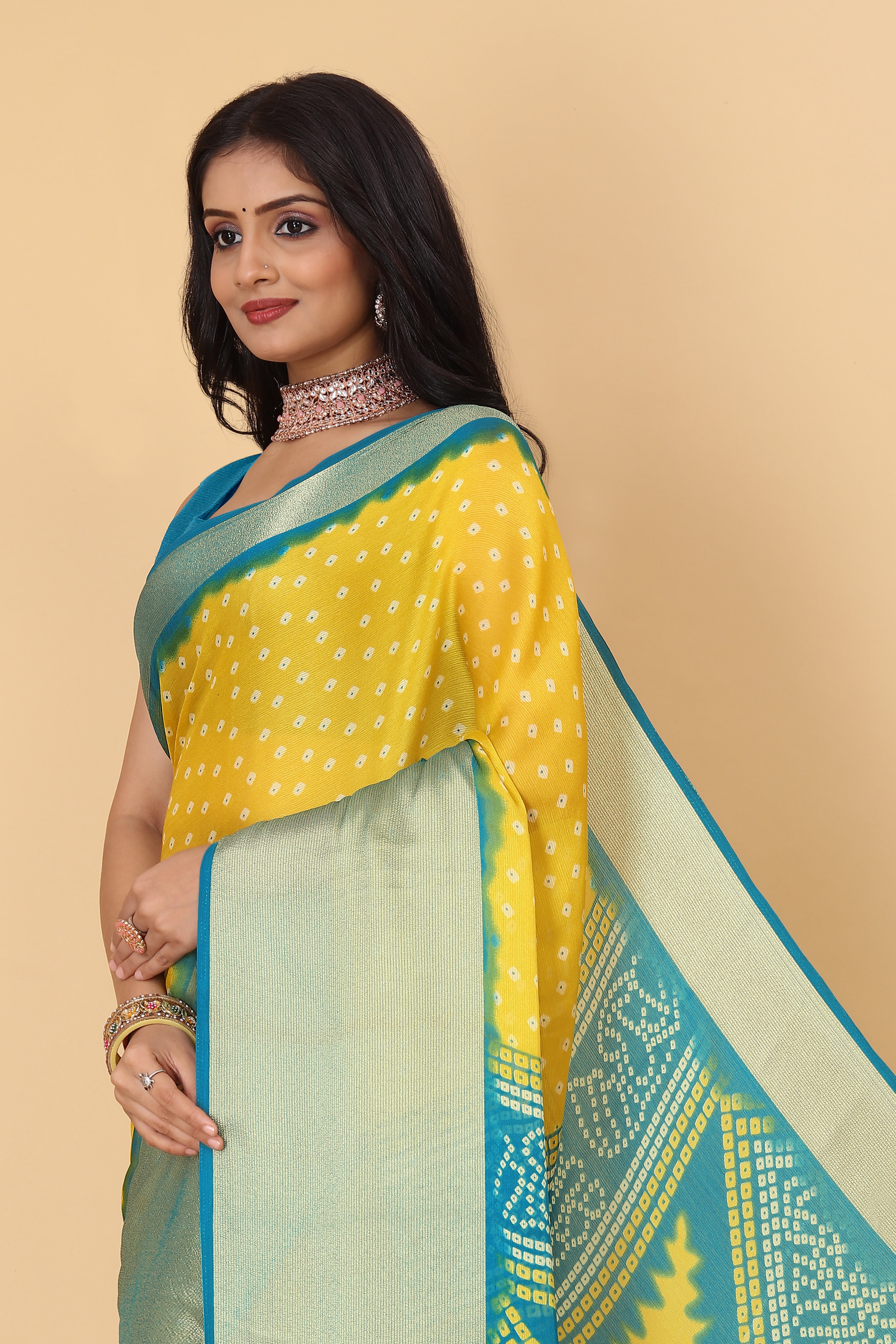 Bandhani Printed Moss Chiffon Yellow Saree with Gold Jari Border | Ivaara.