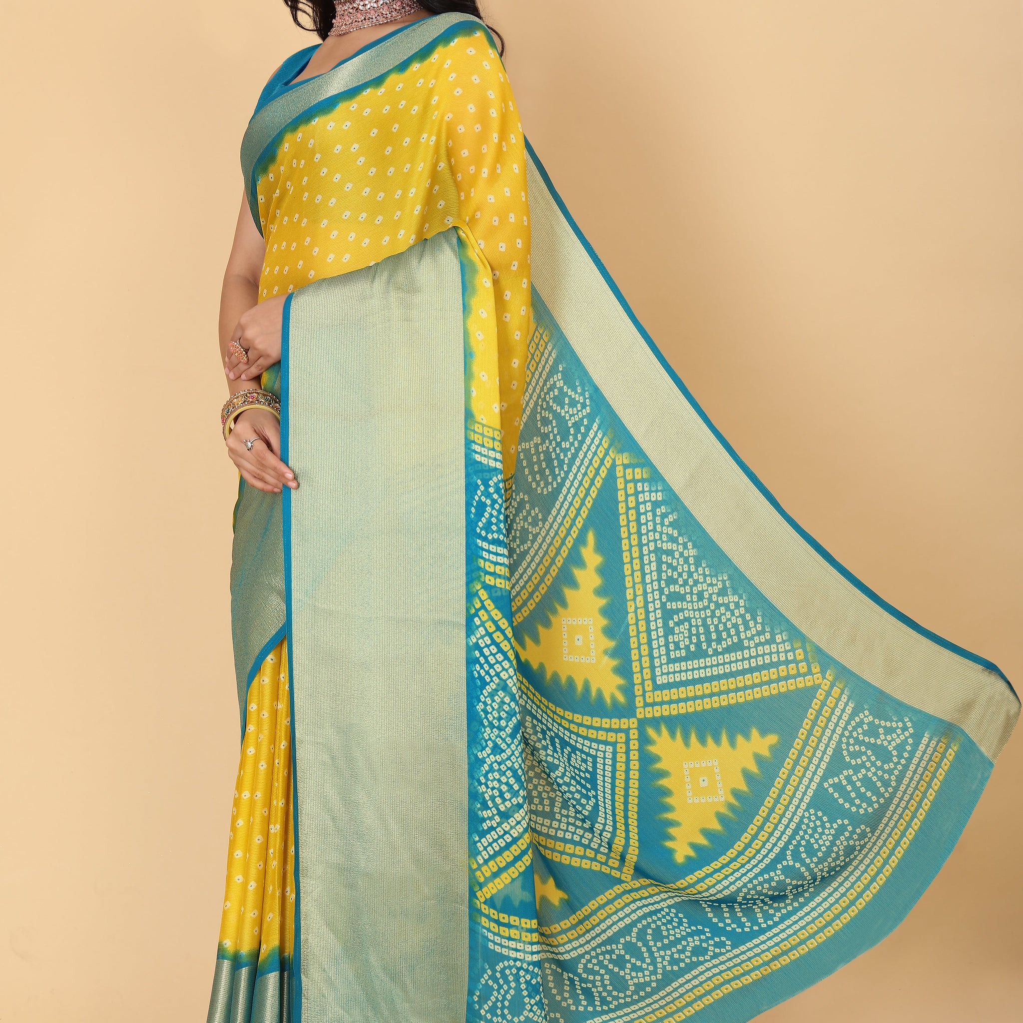 Bandhani Printed Moss Chiffon Yellow Saree with Gold Jari Border | Ivaara.