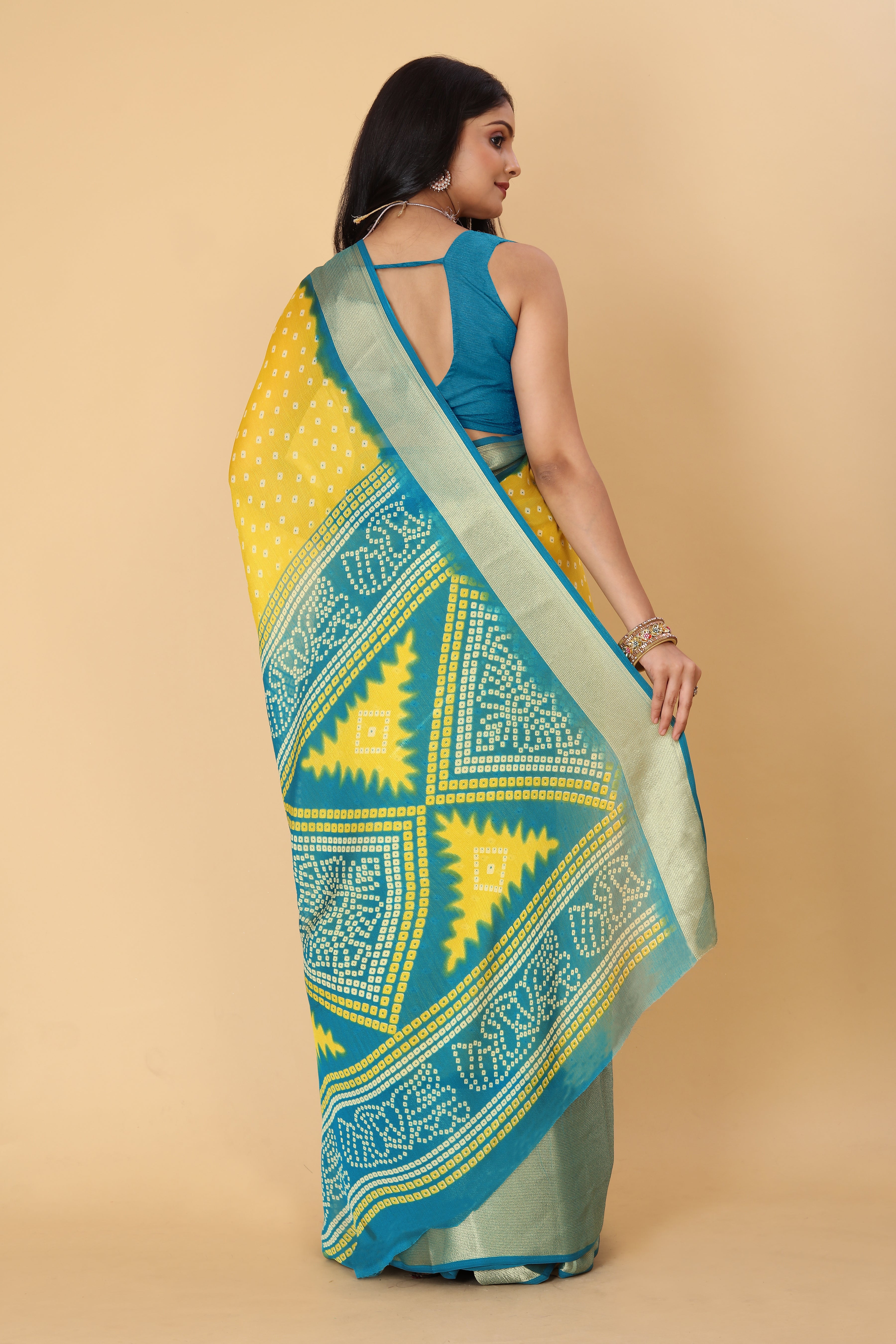 Bandhani Printed Moss Chiffon Yellow Saree with Gold Jari Border | Ivaara.